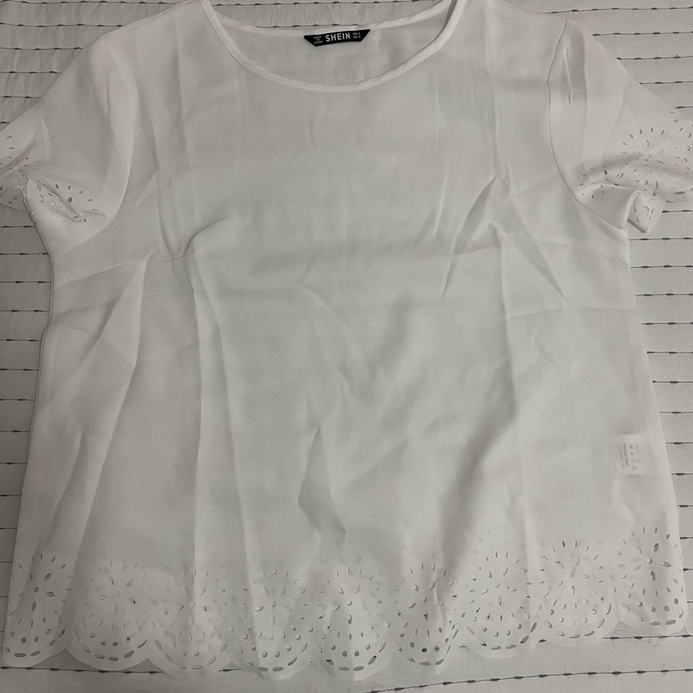 White scalloped blouse